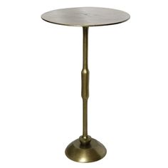 a small table with a metal base and a round top on an isolated white background