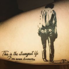 this is the strange life i've ever known tattoo on someones left arm