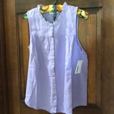 Sleeveless Lavender Top. Ruffled Collar. New. Purple Cotton Sleeveless Blouse, Sleeveless Purple Cotton Blouse, Purple Sleeveless Blouse For Spring, Sleeveless Lavender Cotton Top, Lavender Sleeveless Cotton Top, Spring Lavender Sleeveless Tank Top, Lavender Sleeveless Tank Top For Spring, Purple Sleeveless Tank Top For Day Out, Sleeveless Lavender Cotton Tank Top