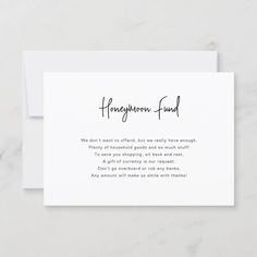 a white card with the words honeymoon fund written on it