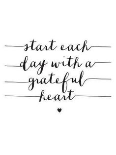 a handwritten quote that says start each day with a grateful heart on white paper