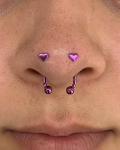 the nose has two pink hearts on it