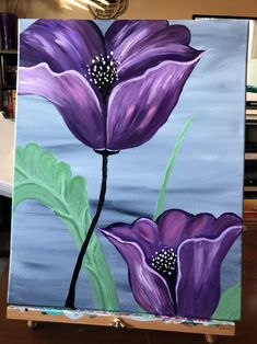 a painting of purple flowers on a blue background