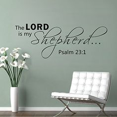 the lord is my shepherd wall decal in a room with a chair and vase