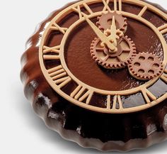 a chocolate cake with a clock on it