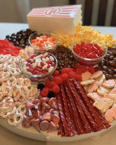 a platter filled with lots of different types of candy