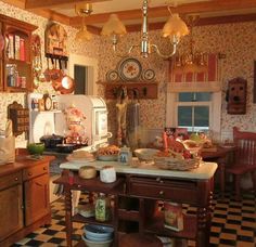 an old fashioned kitchen with checkered flooring and wooden cabinets