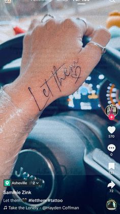 someone is writing on their wrist in the car