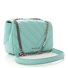 This is an authentic BULGARI Calfskin Matelasse Small Serpenti Cabochon Shoulder Bag in Turquoise. This striking shoulder bag is crafted of quilted calfskin leather and features a front flap with a snake head closure and a silver chain shoulder strap with a leather shoulder pad. The flap opens to a burgundy leather interior with zipper and patch pockets. Snake Head, A Snake, Small Shoulder Bag, Leather Interior, Blue Bags, Pink Bag, Shoulder Pads, Patch Pocket, Calf Skin