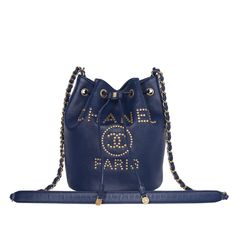 Authentic LIKE NEW Deauville drawstring bucket bag studded caviar leather medium shoulder bag tote. Features blue leather exterior, blue microfiber interior with zipper pocket, and gold-tone hardware. The hologram stamp and the card read: 28649292 Made in Italy 2019 Chanel Deauville, Drawstring Bucket Bag, Bag Packaging, Blue Accents, Blue Bags, Blue Leather, Leather Fashion, Leather Crossbody Bag, Leather Crossbody