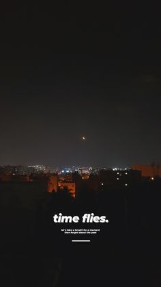 an advertisement for time flies is shown in the dark night sky with city lights behind it