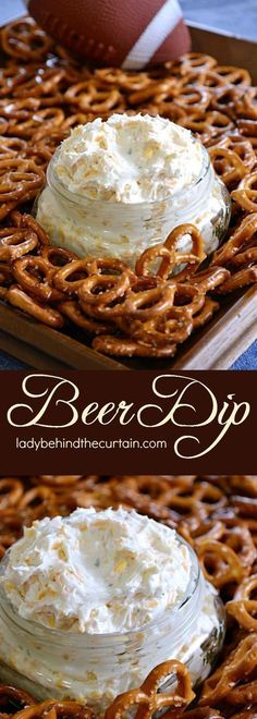 a football and pretzel dip in a glass jar