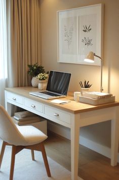 a laptop computer sitting on top of a wooden desk next to a lamp and chair