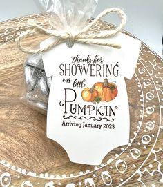 there is a tag that says showering on the pumpkin