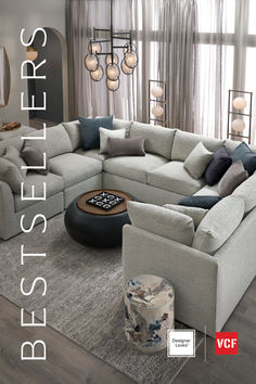 a living room with a large sectional couch in the center and pillows on the back