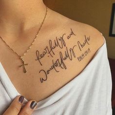 a woman with a cross tattoo on her chest and the words happily god, wonderful made