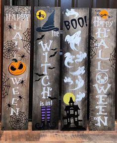 three wooden signs decorated with halloween decorations and words that spell boo, the witch, jack - o - lantern