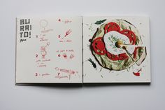 an open book with some drawings on it