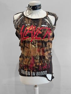 "THE STITCHES Distressed Rock collection - This Slayer tee is a handmade bleached crop top/t-shirt made with a brand new officially licensed band shirt. - Distressed Slayer crop top/shirt - Bespoke safety pin unisex hand-made crop/tee - Material: Bleached cotton Measurements: - One Size - Width (armpit to armpit) 18\" - Length (top of collar to bottom) 25\" - Stretchy T-shirt: Fit UK 8-12, US4-8 Care instructions: - This is a distressed item and will require proper care, it should be washed insi Safety Pin Shirt Ideas, Distressed Rock T-shirt For Streetwear, Distressed Punk T-shirt, Edgy Acid Wash T-shirt For Alternative Fashion, Distressed Rock Style T-shirt For Streetwear, Rock Style Distressed T-shirt For Streetwear, Edgy Acid Wash Distressed T-shirt, Edgy Distressed Tops For Concert, Distressed Rock T-shirt For Concerts