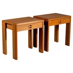 two small wooden tables sitting next to each other