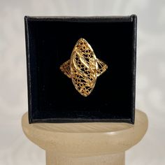 "Vintage Ring - Vintage Gold Tone Gold Plated Etched Laser Cut Ring - Open Work Filigree - \"Diamond Cut\" - Feminine - Size 9 US Brand: Unsigned   Era: Circa 1980's Description: - Cute Ring; Casual Statement - Gold Plated -\"Diamond Cut\" Etched - Magnetic Condition:  Good Some Fading to Back of Band Size: 8.5 US R14 Some of my pieces are vintage with a natural patina that many clients enjoy. I love cleaning jewelry (I find it relaxing), I will be happy to clean a piece for you after you purchase, just let me know. Disclaimer: this may cause a short delay in shipping. Please contact me for Lay-Away Options on one or more pieces.  Please contact me with any questions or requests for further details/pictures, I will reply asap. Please also contact me to make a deal when making multiple purc Laser Cut Ring, Feminine Brand, Details Pictures, Cute Rings, Vintage Ring, Ring Vintage, Cleaning Jewelry, Diamond Cut, Rings Statement