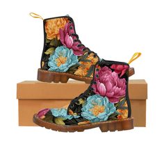 Indulge in comfort and style with our women's floral canvas boots. Crafted from high-quality nylon canvas, these boots are designed for utmost comfort. The anti-heat, anti-moisture, and anti-corrosion foam insole ensures a pleasurable walking experience, while the rubber sole offers stability and durability. Express your unique style confidently with these classic boots, featuring an excellent quality print that turns heads wherever you go. Available in US sizes 6.5 - 11 and equipped with a rear French Braids, Floral Boots, Canvas Boots, Floral Canvas, Classic Boots, French Braid, Work Boots, Boot Shoes Women, Combat Boots