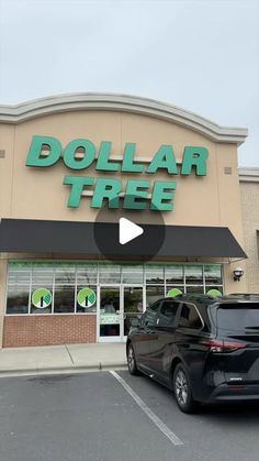 a dollar tree store with cars parked in front