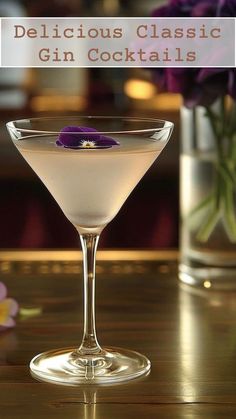 a glass filled with a drink sitting on top of a table