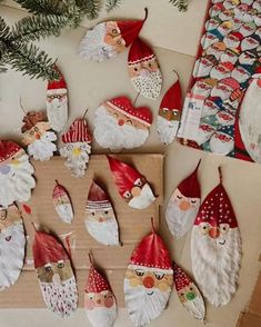 several christmas decorations are displayed on a table