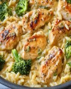 chicken and pasta with broccoli in a skillet