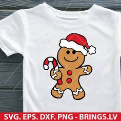 a t - shirt with a ginger wearing a santa hat and holding a candy cane