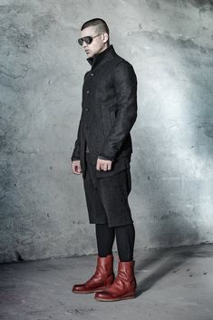 "__BIONIK WOOL JACKET TYPE H __FULLY LINED __RAW HEM __BUTTON CLOSURE __2 FRONT POCKETS __ARM SHAPED SLEEVES __HAND STITCH ON SHOULDERS __HORN BUTTONS model__ chest 103 (40.5\"), waist 77 (30.3\"), hips 96 (37.8\"), biceps 35 (13.8''), height 180 (5'11\"), kg 74 (163 lbs) model wears size M | color: dark grey herringbone, black lining fabric__ 100 wool, lining: 100 cotton care__ dry clean sizing__ size XS (IT 44, US 34, JP 1) chest 92 - 95 cm / 36\" - 37.4\" waist 74 cm / 29.1\" hips 92 cm / 36\ Winter Blazer With Stand Collar And Button Cuffs, Tailored Avant-garde Outerwear For Fall, Avant-garde Formal Outerwear For Fall, Avant-garde Formal Fall Outerwear, Avant-garde Fall Formal Outerwear, Fitted Nehru Jacket With Long Sleeves For Winter, Wool Blazer With Stand Collar And Pockets, Wool Stand Collar Blazer With Pockets, Fitted Nehru Jacket For Winter