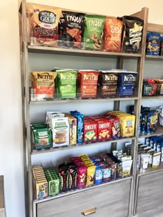 a shelf filled with lots of food and snacks