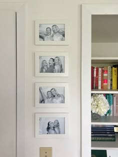 a white book shelf with pictures on it