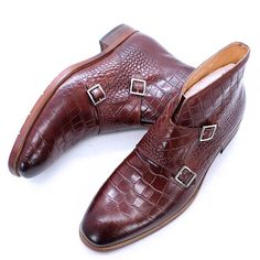 Experience the pinnacle of luxury fashion with these exquisite men's boots. Crafted with genuine cow leather, they feature a crocodile print design, double monk strap buckles, and a round toe shape, perfect for adding a touch of British or Italian street style to your wardrobe. High quality rubber and PU materials ensure lasting comfort and quality. Gift yourself the perfect finishing touch for any outfit with these one-of-a-kind luxury boots. SPECIFICATIONS is_handmade: Yes Upper-Genuine Leathe Men Ankle Boots, Crocodile Boots, Leather Trend, Luxury Boots, Basic Boots, Double Monk Strap, Mens Ankle Boots, Oxford Boots, Buckles Fashion