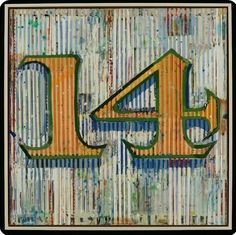 the number forty four is painted in orange and green