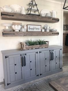 a room with some shelves on the wall and other items on the shelf above it