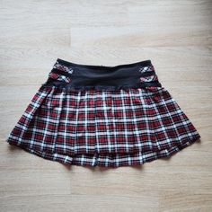 Tripp Nyc Mall Goth Punk Plaid Lace-Trim Pleated Mini Skirt Zip Black Red Polyester Blend Condition Is Pre-Owned In Great Condition. Please Note: -The Real Color Of The Item May Be Slightly Different From The Pictures Shown On Website Caused By Many Factors. -Don't Go By Size Number, Do Check Measurements Listed Below To Determine If The Item Will Fit. Measurements: Approximately (Laying Flat). -Waist: 19 Inches -Length: 17 Inches The Condition Guide: New With Tags - Never Been Used Condition. T Punk Plaid, Mall Goth, Tripp Nyc, Goth Punk, Pleated Mini Skirt, Black Red, Lace Trim, Mini Skirt, Size 16