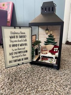 a miniature house with a christmas tree in it and a sign that says, what do they do?