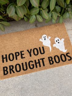 a door mat that says, hope you brought boosies on the front porch