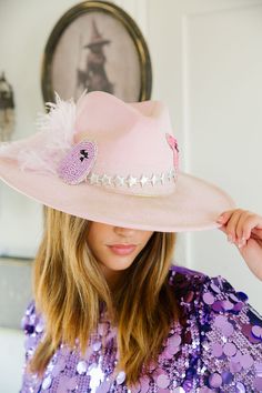 Add a touch of spooky style to your look with our Girly Ghost Pink Rancher Hat. This playful hat features a pink ribbon band, silver stars band, and colorful beaded ghost patches. With its unique design, you'll stand out from the crowd and have a fun, whimsical accessory for any outfit. This hat is ONE OF A KIND, created by our owner Stephanie. To receive item quicker, expedited shipping is available at checkout. Beaded Ghost, Girly Ghost, Usa Party, Whimsical Accessories, Spooky Style, Mini Sales, Rancher Hat, Thanksgiving Sale, Valentines Sale