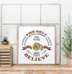 the bell is for those who truly believe framed print on a shelf next to a potted plant