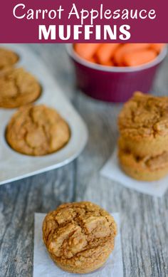 carrot applesauce muffins on a table with other muffins in the background