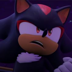 an animated image of sonic the hedgehog with his hands on his hips and looking angry