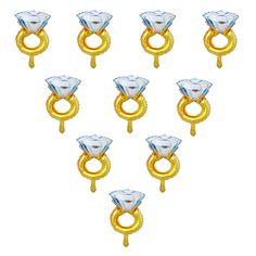 twelve gold and clear glass rings with handles