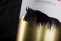 a close up of a bottle of wine with an animal on it's label