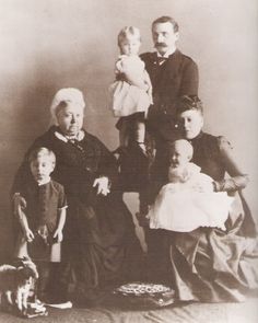 an old black and white photo of a family