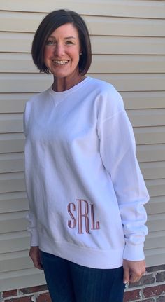 "WE NOW OFFER COMFORT WASH SWEATSHIRTS WHICH ARE BASICALLY THE SAME FABRIC AND SAME FIT AS COMFORT COLOR SWEATSHIRTS. SINCE THEY ARE MORE PLENTIFUL WITH THE SUPPLIERS, WE CAN OFFER MORE COLORS IN STOCK. Stylish Comfort Wash sweatshirt. Cute with leggings or jeans or whatever you choose! Monogram included in price and can be put at lower hem as shown in pic, center of chest, or smaller monogram on left chest. Your choice! Be sure to include this with your monogram in the \"note\" section of your White Relaxed Fit T-shirt With Letter Embroidery, White Crew Neck Sweater For Loungewear, White Crew Neck Relaxed Fit Sweater, White Relaxed Fit Crew Sweater, Basic White Crew Neck Sweater, White Relaxed Fit Basic Sweater, White Crew Neck Sweater For College, White Relaxed Fit Crew Sweatshirt, Oversized White Sweatshirt With Letter Embroidery