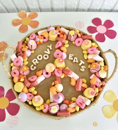 there is a cake decorated with letters and flowers