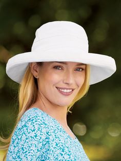 This sun hat not only blocks the sun from your eyes, it also protects your entire head and face. It features UPF 50+ sun protection that blocks 97. 5% of UV rays and a 4" wide brim that shades your face. An inner sweatband wicks away moisture and the adjustable inner drawstring provides a personalized fit. 50+ UPF protection 4" flexible brim — wear it up or down Inner adjustable drawstring and sweatband Packable — great for travel One size fits head sizes up to 22-1/2" circumference 100% cotton Spring Sun Hat Upf 50+ One Size Fits Most, Spring Sun Hat With Upf 50+, Hats With Uv Protection For Beach Season, Uv Protection Wide Brim Sun Hat, Upf 50+ Wide Brim Bucket Hat For Sunbathing, Lightweight Uv Protection Sun Hat For Spring, Solid Brimmed Sun Hat With Uv Protection, Wide Brim Bucket Hat With Upf 50+ For Sunbathing, Solid Wide Brim Bucket Hat With Upf 50+